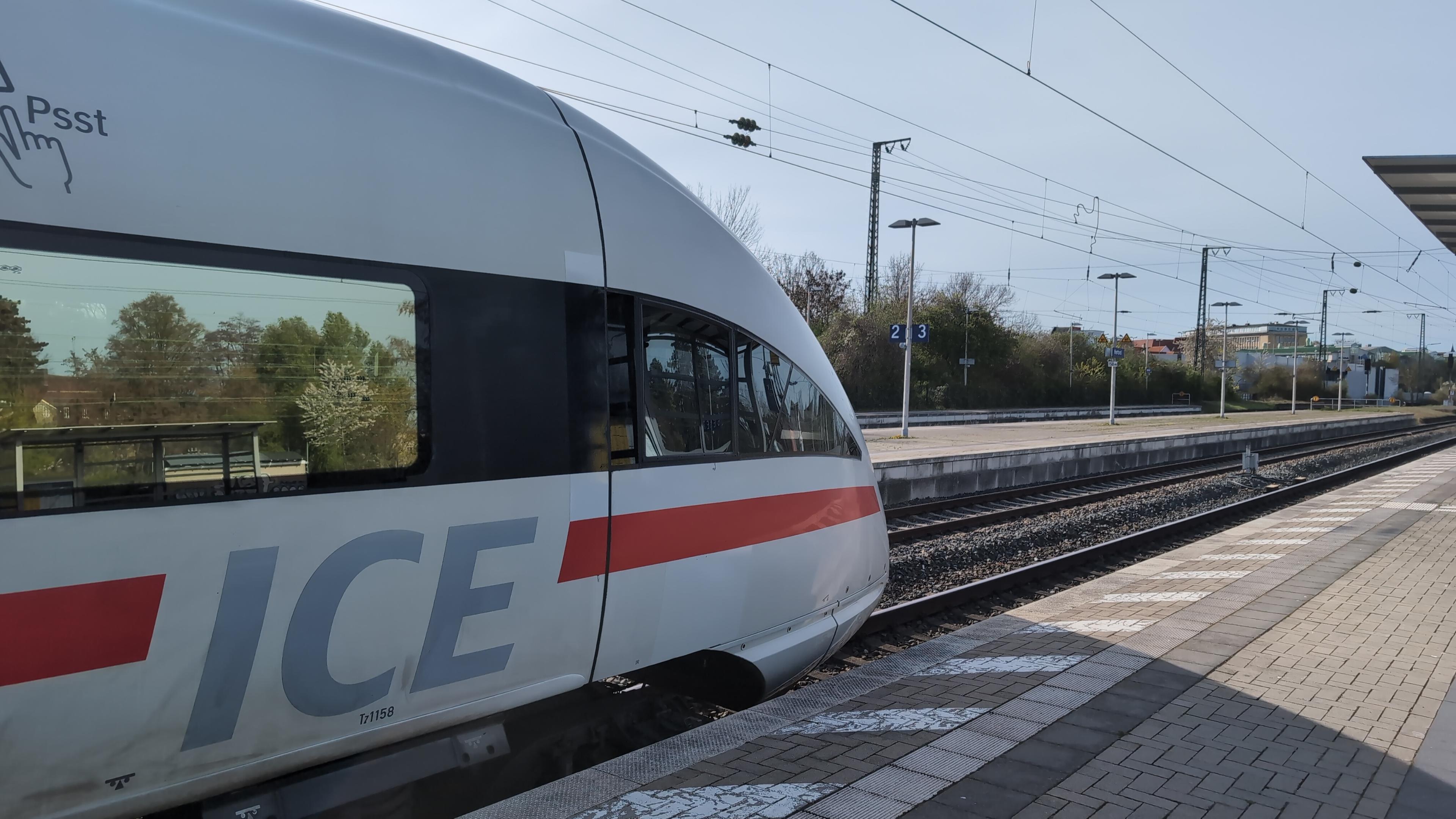 Nose of an ICE T in a small railway station.