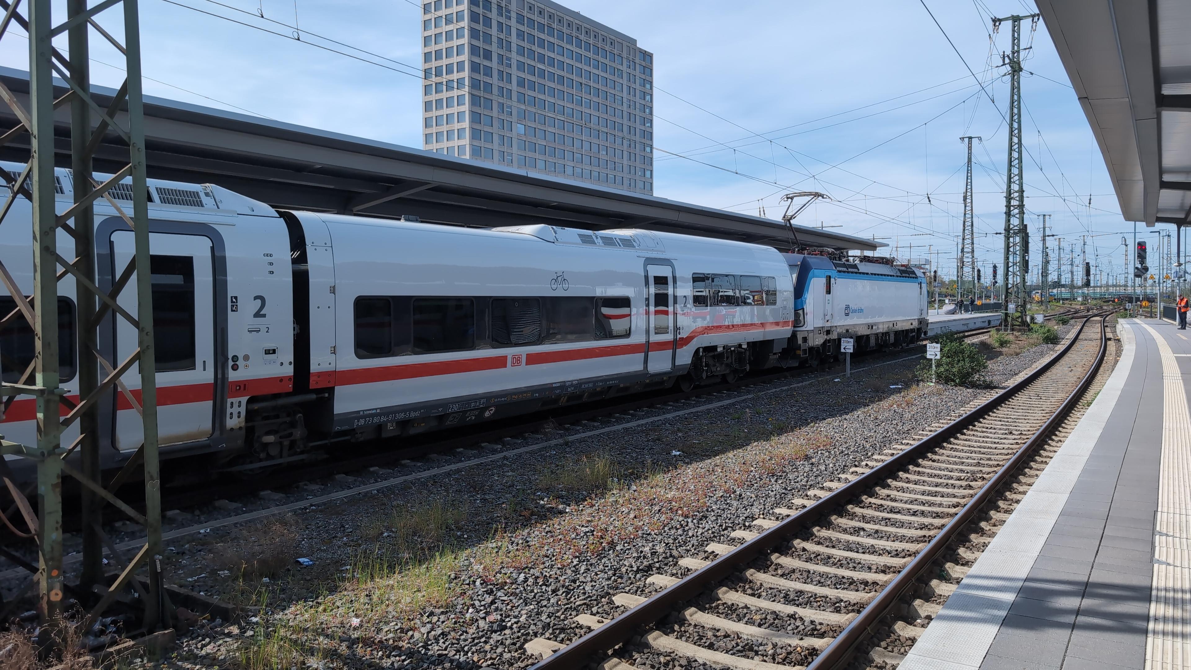 A DB Talgo on the opposite track, still with the CD Vectron.
